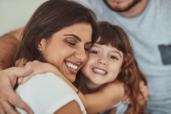 files/happy-mother-kid-hug-family-600nw-2525978921.webp